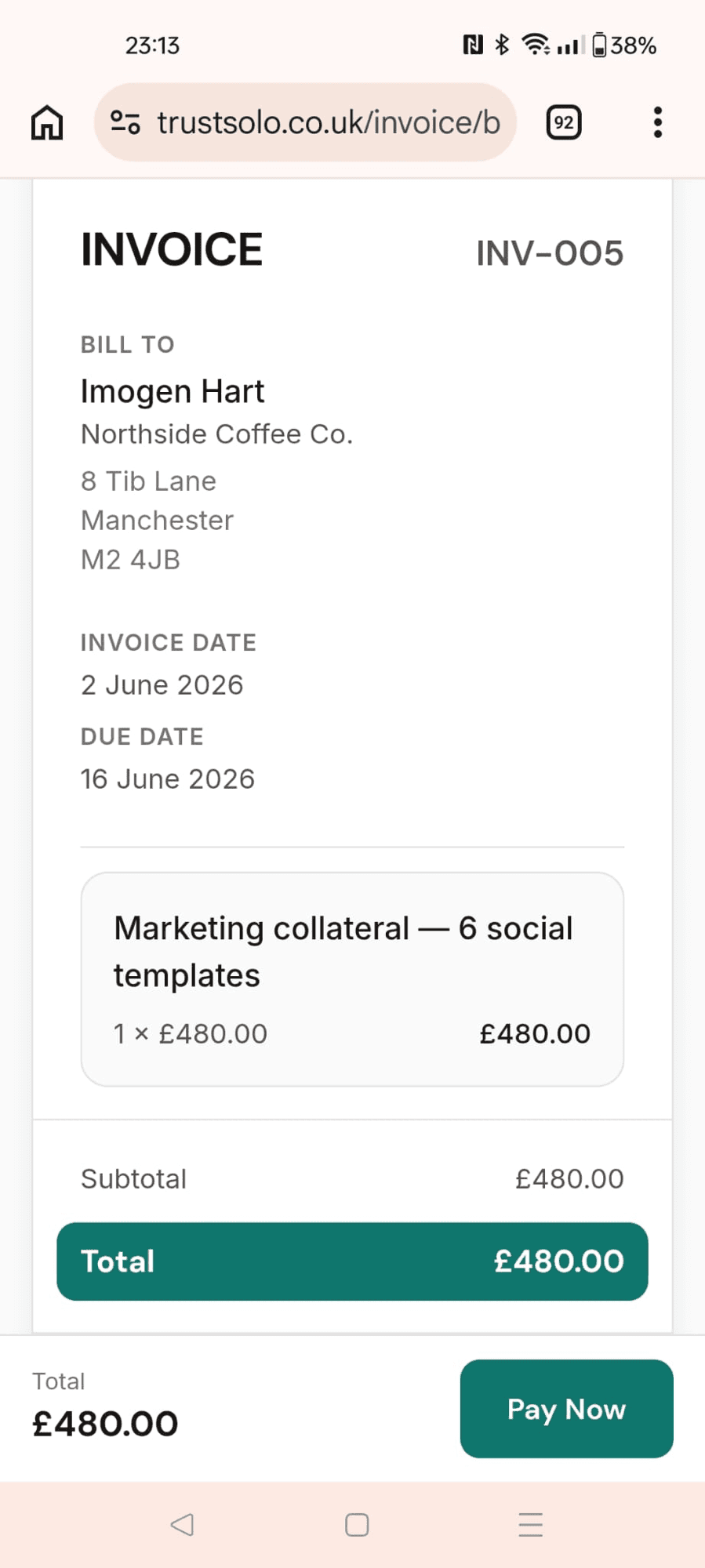 A client paying an invoice on a phone